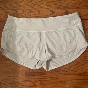 white lululemon shorts